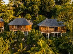 an aerial view of a resort in the jungle at de Bintan Villa in Tenaga