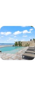 a rendering of a beach with a view at Sol y mar in Rosarito Beach