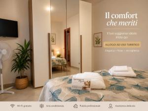 a room with a bed with a sign on it at Appartamento Magnolia 209 in Pomezia