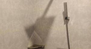 a shadow of a shower head on a wall at Meatophum Samnang in Battambang