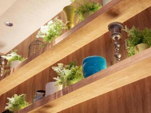 a set of stairs with potted plants on them at Comfort Suites Tokyo Bay in Urayasu
