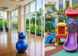 a room with a play equipment and a building at Residencia Nova, Jakarta in Jakarta