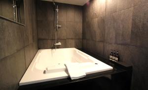 Koupelna v ubytování Hotel Foret Premier Nampo + 35 fotografií