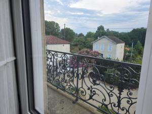 a view from a window of a balcony at Villa Aestival in Saint-Symphorien