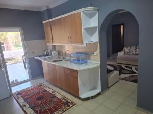 a kitchen with a sink and a counter top at Ören örtur tatil evleri in Ören +20 photos