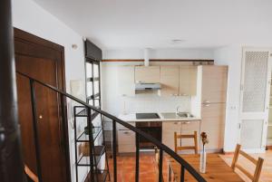 Kuchyň nebo kuchyňský kout v ubytování Apartamento Torre y Sol