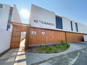 a building with a sign on the side of it at 42 on Kavango Unit 24 in Swakopmund