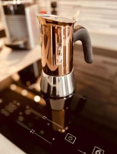 a coffee pot sitting on top of a counter at Apartment Vitale in Bologna