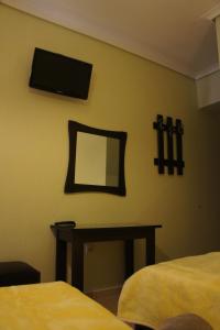 Postel nebo postele na pokoji v ubytování Hotel Venus