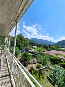a view from the balcony of a house at Villa Borjomi in Akhaldaba +44 photos