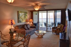 a living room with a couch and a table at Royal Mauian 307 in Kihei