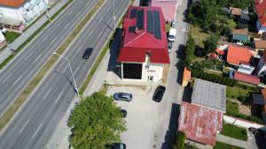 an aerial view of a street with a red roof at Penzion Maja in Martin