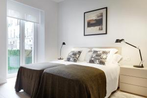 Posteľ alebo postele v izbe v ubytovaní Oteiza by FeelFree Rentals