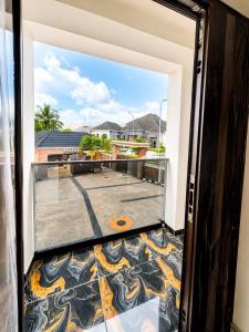a view from the door of a balcony at Little Afrika in Port Harcourt