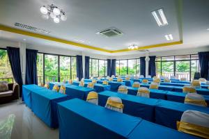 a conference room with blue tables and chairs at Phangpring Beach Resort in Ban Phang Pling +46 photos