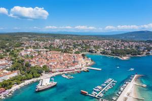 an aerial view of a harbor with boats in the water at Rooms with a parking space Krk - 5371 in Krk