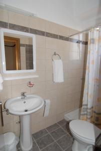 Koupelna v ubytování Hotel Venus + 24 fotografií