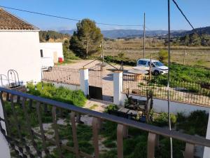 a view from the balcony of a house at Mas De La Salut in Sant Jaume Sas Oliveras +16 photos
