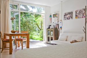 Giường trong phòng chung tại Achter het witte huis