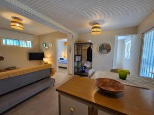 a living room with a couch and a table at Greek Memories in Artemida
