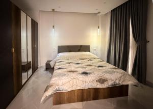 a bedroom with a large bed in a room at Bohemia palace in Hurghada +95 photos