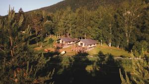 an aerial view of a house on a hill at Lodge Holidays - Les Sapins in Camurac