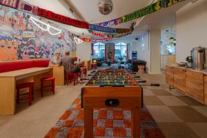 a room with a table with a chessboard at Yes Lisbon Hostel in Lisbon