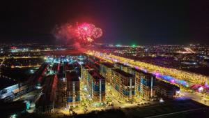 a fireworks display over a city at night at Sunora Stay A6 in Quang Ãm +4 photos