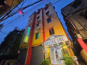 a building with a hotel sign on it at Hotel JBL in kolkata