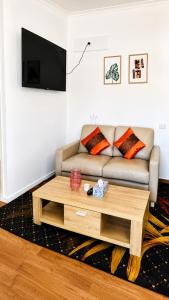 a living room with a couch and a coffee table at Private Guest Studio House, Separate Entry in Brisbane