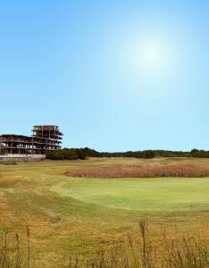 a view of the ninth green on the golf course at North beach Pinamar in Pinamar
