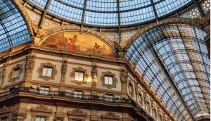 a building with a domed ceiling and a glass ceiling at Hotel Stradivari in Milan