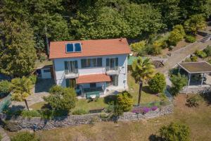 an overhead view of a house with an orange roof at Residenza sul Lago Maggiore in Luino