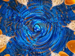 a close up view of a blue spiral at Raffles Doha in Doha