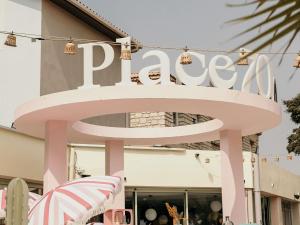 a pink sign for a pizza restaurant at ibis Styles Pont du Gard Route d'Avignon in Estézargues +30 photos