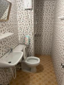 a bathroom with a toilet and a sink at Dailyroom C3,C4by Anna in Nonthaburi +52 photos