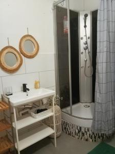 a bathroom with a shower and a sink and a toilet at 2 Bedroom-Boho-Style-Apartment in Sankt Veit an der Glan +34 photos