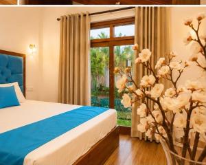 a bedroom with a bed and a window at The Oak Residence in Ragama