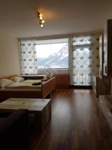 Postel nebo postele na pokoji v ubytování Ferienwohnung - Apartment Pichlarn Irdning + 37 fotografií