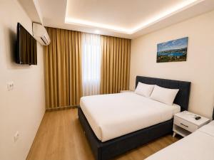 a hotel room with a bed and a window at Stay Istanbul Hotel in Istanbul
