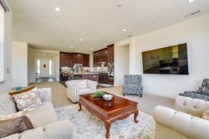 a living room with couches and a coffee table at Private Yard & Patio! Modern Manteca Gem in Manteca