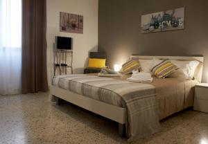 Katil atau katil-katil dalam bilik di Casa Gaia Palermo