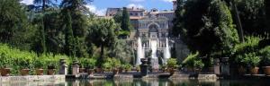 a building with a fountain in the middle of a garden at Maximo Hotel in Tivoli Terme