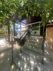 a set of stairs in front of a building at Къща за гости Амбър in Burgas
