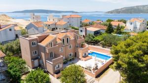 an aerial view of a house with a swimming pool at Villa Best Relax in Okrug Donji