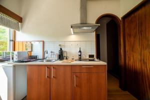 a kitchen with a sink and a counter top at Travessa in Lisbon