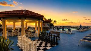 a chess board on the beach with a gazebo at Hollywood Beach Tower in Hollywood
