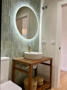 a bathroom with a sink and a mirror at Quinta del Mar suites - Costa Quebrada in Soto de la Marina +15 photos