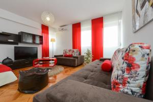 TV a/nebo společenská místnost v ubytování Roman Forum Apartments