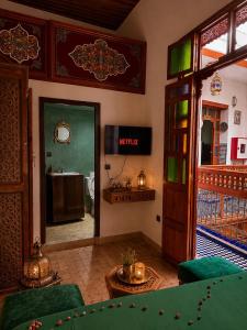 a living room with a view of a bathroom at Riad Hamad Tijani in Fez +16 photos